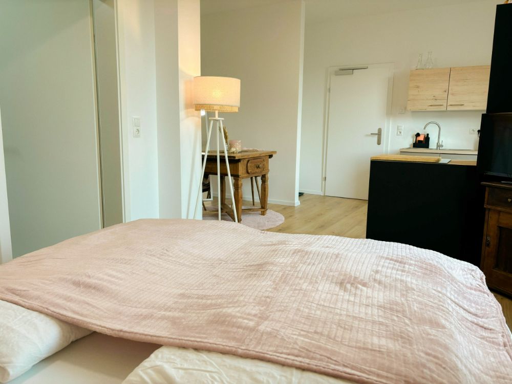 Schlaf- & Küchenbereich Apartment Zwei